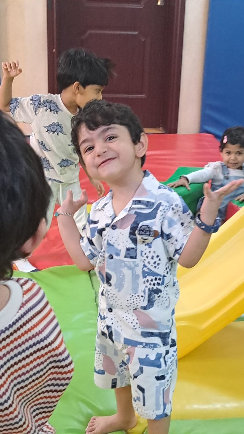Children playing together in the indoor soft-play area