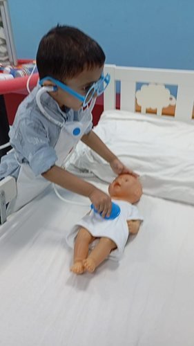 A child enjoying imaginative doctor role-play